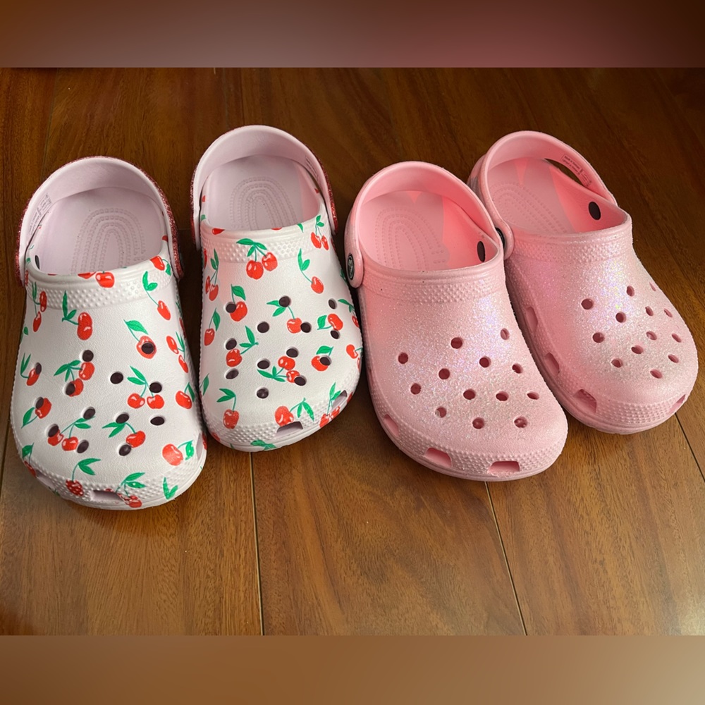 Two Pairs of Girls Crocs size 1